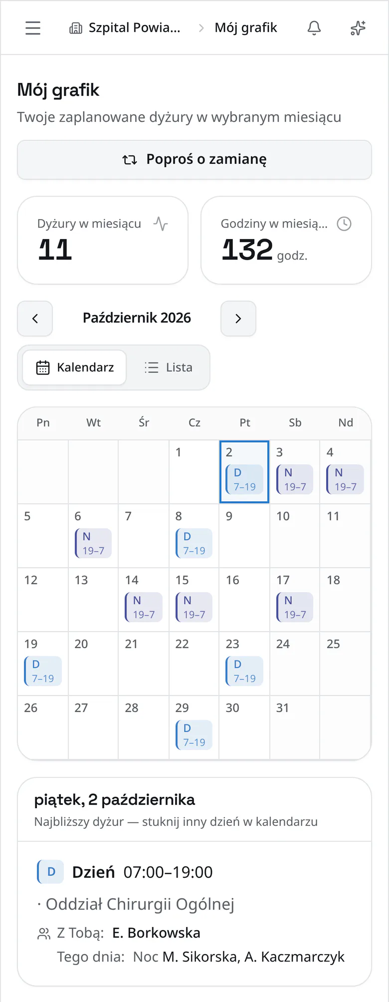 Widok „Mój grafik” na telefonie pracownika: kalendarz własnych dyżurów na październik 2026, liczba dyżurów i godzin w miesiącu oraz szczegóły najbliższego dyżuru z osobami na tej samej zmianie.